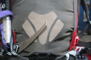 Ice Axe attached to an Ospey Pack